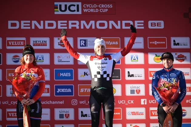 L-R, second Dutch Puck Pieterse, winner Dutch Lucinda Brand and third French Amandine Fouquenet celebrate on the podium at the women s elite race at the World Cup cyclocross cycling event in Dendermonde, Belgium, stage 8 (out of 12) of the UCI World Cup cyclocross competition, Sunday 28 December 2025. DAVIDxPINTENS  x151930681x