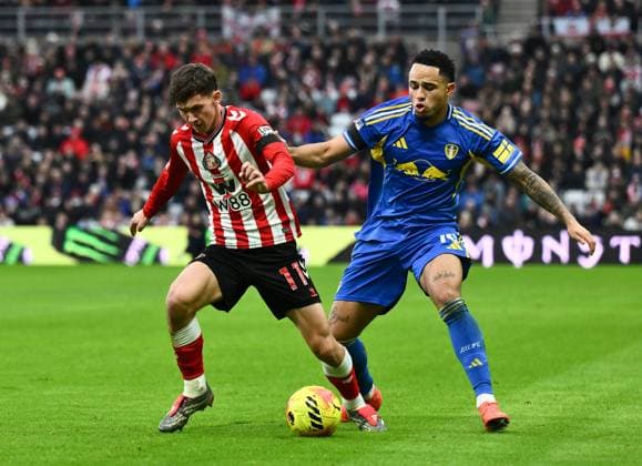 Chris Rigg of Sunderland (left) and Noah Okafor of Leeds United Sunderland v Leeds United, Premier League, Football, Stadium of Light, Sunderland, UK - 28 Dec 2025Sunderland Stadium of Light United Kingdom EDITORIAL USE ONLY No use with unauthorised audio, video, data, fixture lists, club league logos or live services. Online in-match use limited to 120 images, no video emulation. No use in betting, games or single club league player publications. Copyright: xRichardxLee Shutterstockx 16213166ab