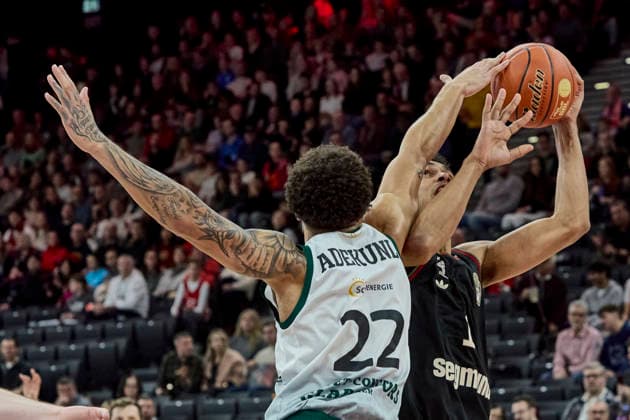 German Basketball Bundesliga BBL , FC Bayern Munich Basketball vs VET CONCEPT GLADIATORS TRIER, Munich FC Bayern Basketball, TRIER VET CONCEPT GLADIATORS, 2025 12 28 in Munich SAP Garden ADEKUNLE Nolan VET CONCEPT GLADIATORS TRIER Small Forward SF Nr 22 TRI22 , DA SILVA Oscar FC Bayern Basketball PF Nr1 FCBB1 sportworld Munich SAP Garden Bayern Germany