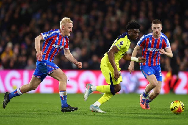 London, England, 28th December 2025. Mohammed Kudus of Tottenham Hotspur with the ball between Will Hughes (L) and Adam Wharton of Crystal Palace during the Crystal Palace vs Tottenham Hotspur Premier League match at Selhurst Park, London. Picture credit should read: Paul Terry Sportimage EDITORIAL USE ONLY. No use with unauthorised audio, video, data, fixture lists, club league logos or live services. Online in-match use limited to 120 images, no video emulation. No use in betting, games or single club league player publications. SPI_042_PT_Crystal_Palace_Tottenham SPI-4399-0042
