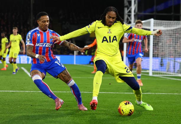 London, England, 28th December 2025. Nathaniel Clyne of Crystal Palace and Djed Spence of Tottenham Hotspur challenge for the ball during the Crystal Palace vs Tottenham Hotspur Premier League match at Selhurst Park, London. Picture credit should read: Paul Terry Sportimage EDITORIAL USE ONLY. No use with unauthorised audio, video, data, fixture lists, club league logos or live services. Online in-match use limited to 120 images, no video emulation. No use in betting, games or single club league player publications. SPI_045_PT_Crystal_Palace_Tottenham SPI-4399-0045