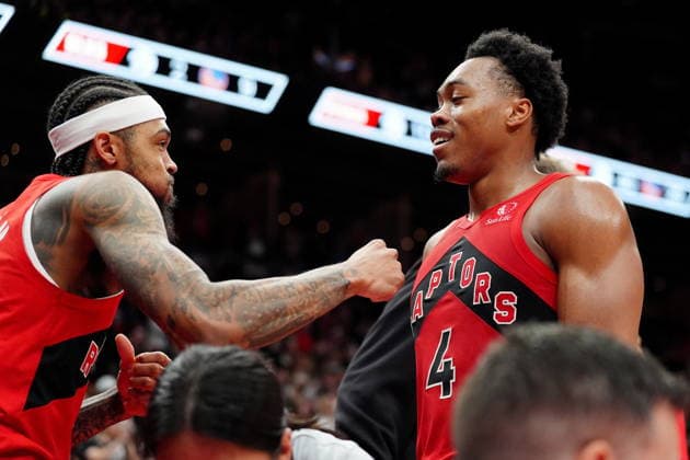 December 28, 2025, Toronto, On, CANADA: Toronto Raptors forward Brandon Ingram (3) and teammate Scottie Barnes (4) celebrate following their overtime win over the Golden State Warriors at the end of NBA, Basketball Herren, USA basketball action in Toronto, Sunday, Dec. 28, 2025. Canada News - December 28, 2025 - ZUMAc35_ 20251228_zaf_c35_020 Copyright: xFrankxGunnx