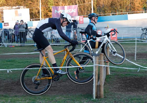 28 12 2025 Cycling Darmstadt cyclo-cross race at the velodrome here race juniors U19 and elite men here left start number 87 Elias Ray U23m RSV Seeheim right start number 20 cyclo-cross world champion Sascha Starker SSG Bensheim Darmstadt Hesse Germany