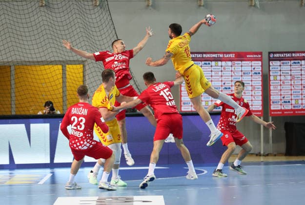 Croatia v North Macedonia: Friendly match Berislav Antonio Tokic of Croatia tries to block a shoot from Filip Kuzmanovski of North Macedonia during the friendly handball match between Croatia and North Macedonia at Zatika Hall od December 28, 2025. in Porec, Croatia.  SasaxMiljevic PIXSELL
