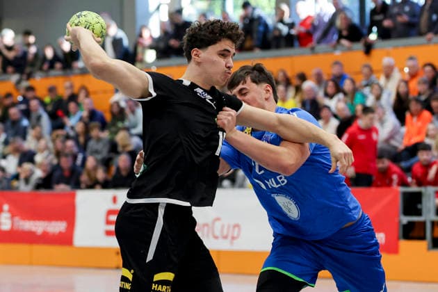 Leo Nowak Germany and Tjas Erculj Slovenia battle for the ball, Merzig Cup semi-final, Germany vs Slovenia, Thiels Park Sporthalle on December 29, 2025 in Merzig, Germany Photo by Marco Steinbrenner DeFodi Images Leo Nowak Germany and Tjas Erculj Slovenia battle for the ball, Merzig Cup semi-final, Germany vs Slovenia, Thiels Park Sporthalle, December 29, 2025 in Merzig, Germany Photo by Marco Steinbrenner DeFodi Images