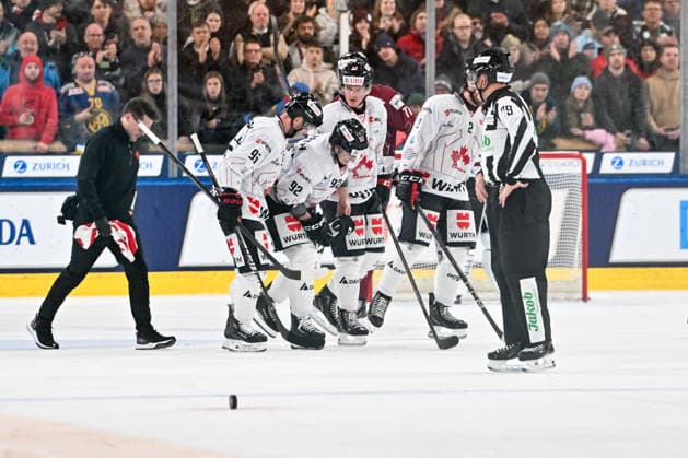 DAVOS, SWITZERLAND DECEMBER 29 Mike Sgarbossa of Team Canada leaves the ice injuried during the Spengler Cup Davos match between HC Sparta Praha v Team Canada at Zondacrypto Arena on December 29, 2025 in Davos, Switzerland Davos Graubunden Switzerland Copyright: xJustPictures.ch AndreaxBrancax jp-en-EuSpIm-AB_29122025_AAB_5143