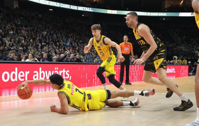 Jack Kayil on the ball, Bennet Hundt, Jonas Wohlfahrt Bottermann duel Game scene Action Sport Basketball BBL Bundesliga Men 1 Matchday Season 2025 2026 29 12 2025 ALBA Berlin vs MHP Riesen Ludwigsburg