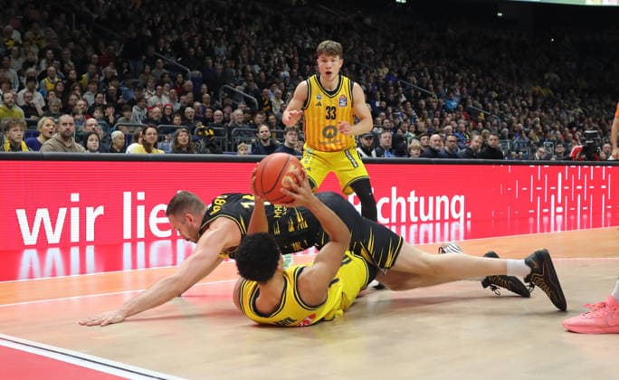 Jack Kayil on the ball, Bennet Hundt, Jonas Wohlfahrt Bottermann duel Game scene Action Sport Basketball BBL Bundesliga Men 1 Matchday Season 2025 2026 29 12 2025 ALBA Berlin vs MHP Riesen Ludwigsburg