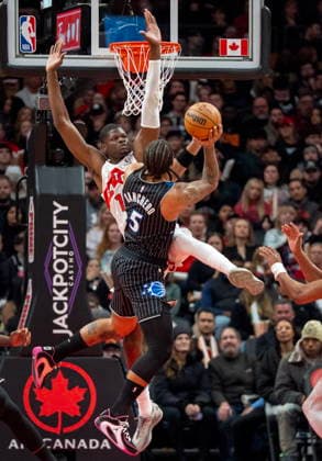 December 29, 2025, Toronto, On, Canada: Toronto Raptors centre Mo Bamba (11) defends against Orlando Magic forward Paolo Banchero (5) as he shoots during first half NBA, Basketball Herren, USA action in Toronto on Monday December 29, 2025. Canada News - December 29, 2025  - ZUMAc35_ 20251229_zaf_c35_044 Copyright: xFrankxGunnx