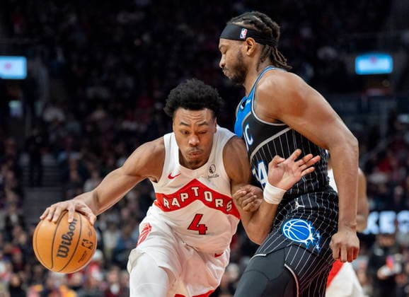 December 29, 2025, Toronto, On, Canada: Toronto Raptors forward Scottie Barnes (4) runs into stiff defence as he drives against Orlando Magic centre Wendell Carter Jr. (34) during first half NBA, Basketball Herren, USA action in Toronto on Monday December 29, 2025. Canada News - December 29, 2025  - ZUMAc35_ 20251229_zaf_c35_046 Copyright: xFrankxGunnx