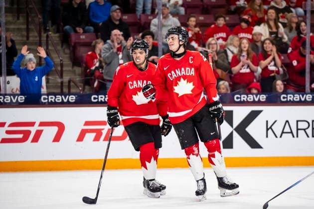 December 29, 2025, Minneapolis, Mn, Canada: Canada s Porter Martone (22) celebrates his goal with teammate Tij Iginla (11) During third period IIHF World Junior Championship hockey action against Denmark in Minneapolis on Monday, Dec. 29, 2025. Canada News - December 29, 2025  - ZUMAc35_ 20251229_zaf_c35_075 Copyright: xChristopherxKatsarovx