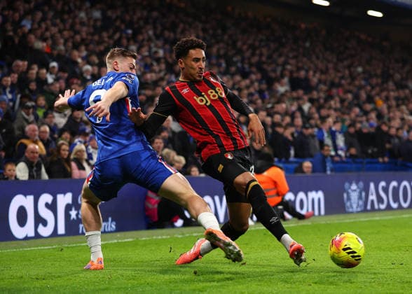 30th December 2025; Stamford Bridge, Chelsea, London, England: Premier League Football, Chelsea versus Bournemouth; Liam Delap of Chelsea challenged by James Hill of AFC Bournemouth  JohnxPatrickxFletcher