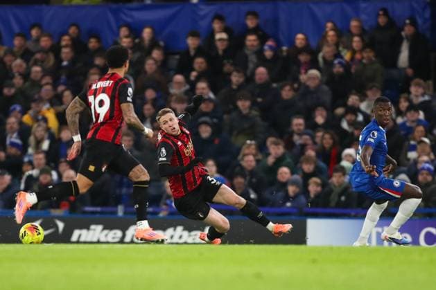 MoisÃ s Caicedo of Chelsea fouls Adrien Truffert of AFC Bournemouth which results in a yellow card Chelsea v AFC Bournemouth, Football, Premier League, Stamford Bridge, London, UK, 30 12 25 EDITORIAL USE ONLY No use with unauthorised audio, video, data, fixture lists (outside the EU), club league logos or live services. Online in-match use limited to 45 images (+15 in extra time). No use to emulate moving images. No use in betting, games or  Copyright: xAnthonyxHanc Shutterstockx 16218122k