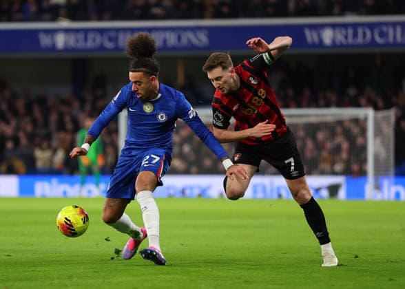 30th December 2025; Stamford Bridge, Chelsea, London, England: Premier League Football, Chelsea versus Bournemouth; Malo Gusto of Chelsea challenged by David Brooks of AFC Bournemouth  JohnxPatrickxFletcher