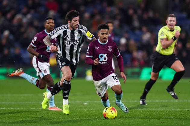 Burnley, England, 30th December 2025. Marcus Edwards of Burnley breaks past Sandro Tonali of Newcastle United during the Burnley vs Newcastle United Premier League match at Turf Moor, Burnley. Picture credit should read: Craig Thomas Sportimage EDITORIAL USE ONLY. No use with unauthorised audio, video, data, fixture lists, club league logos or live services. Online in-match use limited to 120 images, no video emulation. No use in betting, games or single club league player publications. SPI_046_CT_BURNLEY_V_NEWCASTLE_UNITED SPI-4401-0051