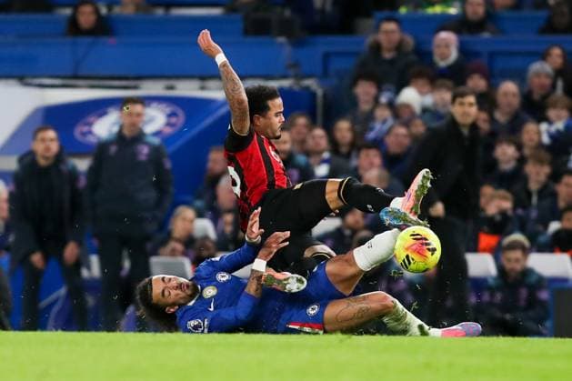 Justin Kluivert of AFC Bournemouth is tackled by Malo Gusto of Chelsea Chelsea v AFC Bournemouth, Football, Premier League, Stamford Bridge, London, UK, 30 12 25 EDITORIAL USE ONLY No use with unauthorised audio, video, data, fixture lists (outside the EU), club league logos or live services. Online in-match use limited to 45 images (+15 in extra time). No use to emulate moving images. No use in betting, games or  Copyright: xAnthonyxHanc Shutterstockx 16218122ad