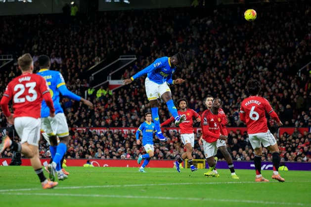 Manchester United, ManU v Wolverhampton Wanderers, Premier League Tolu Arokodare (14) of Wolverhampton Wanderers has a header on goal during the Premier League match between Manchester United and Wolverhampton Wanderers at Old Trafford, Manchester, UK on 30 December 2025. Manchester Old Trafford Greater Manchester UK Editorial use only DataCo restrictions apply See www.football-dataco.com , Copyright: xConorxMolloyx PSI-23486-0045