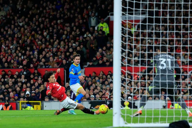 Manchester United, ManU v Wolverhampton Wanderers, Premier League Hugo Bueno (3) of Wolverhampton Wanderers has a shot on goal during the Premier League match between Manchester United and Wolverhampton Wanderers at Old Trafford, Manchester, UK on 30 December 2025. Manchester Old Trafford Greater Manchester UK Editorial use only DataCo restrictions apply See www.football-dataco.com , Copyright: xConorxMolloyx PSI-23486-0053