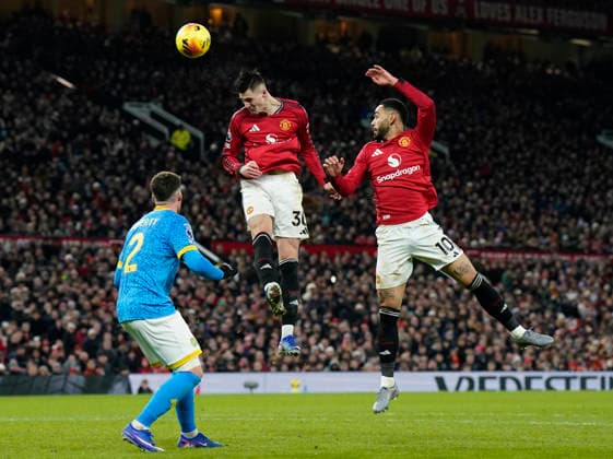 Manchester, England, 30th December 2025. Benjamin Sesko of Manchester United, ManU has this header saved during the Manchester United vs Wolverhampton Wanderers Premier League match at Old Trafford, Manchester. Picture credit should read: Andrew Yates Sportimage EDITORIAL USE ONLY. No use with unauthorised audio, video, data, fixture lists, club league logos or live services. Online in-match use limited to 120 images, no video emulation. No use in betting, games or single club league player publications. SPI_072_AY_Man_Utd_Wolves SPI-4404-0073