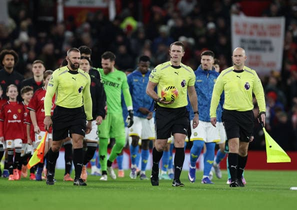 30th December 2025; Old Trafford, Manchester, England; Premier League Football, Manchester United, ManU versus Wolverhampton Wanderers; referee Thomas Bramall leads out the players  RogerxEvans