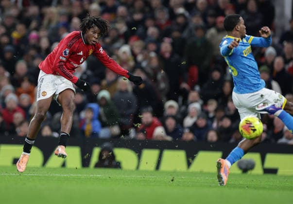 30th December 2025; Old Trafford, Manchester, England; Premier League Football, Manchester United, ManU versus Wolverhampton Wanderers; Patrick Dorgu of Manchester United shoots  RogerxEvans