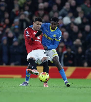 30th December 2025; Old Trafford, Manchester, England; Premier League Football, Manchester United, ManU versus Wolverhampton Wanderers; Casemiro of Manchester United is under pressure from Yerson Mosquera of Wolverhampton Wanderers  RogerxEvans
