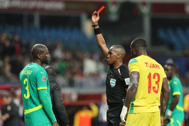 TotalEnergies CAF AFACON Morocco 2025 - Satde Moulay Abellah - Rabat - Morocco referee Samuel Uwikunda (RWA) shows a red card to SenegalÂ s Kalidou Koulibaly 3 during the Africa Cup of Nations (CAN) 2025 football match between Senegal and Benin at the Grand Satde of Tanger n Tanger on December 30, 2025. Copyright: xloulidiphotox