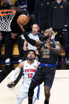 December 30, 2025, Los Angeles, California, USA: Los Angeles Lakers LeBron James (23) goes past Detroit Pistons Tobias Harris (12) to the basket during an NBA, Basketball Herren, USA basketball game on Tuesday, Dec. 30, 2025 in Los Angeles. Los Angeles USA - ZUMAc68_ 20251230_zaf_c68_019 Copyright: xRingoxChiux