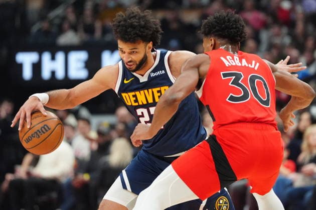 December 31, 2025, Toronto, On, CANADA: Denver Nuggets guard Jamal Murray (27) tries to get around Toronto Raptors guard Ochai Agbaji (30) during first half NBA, Basketball Herren, USA action in Toronto on Wednesday December 31, 2025. Canada News - December 31, 2025  - ZUMAc35_ 20251231_zaf_c35_048 Copyright: xFrankxGunnx