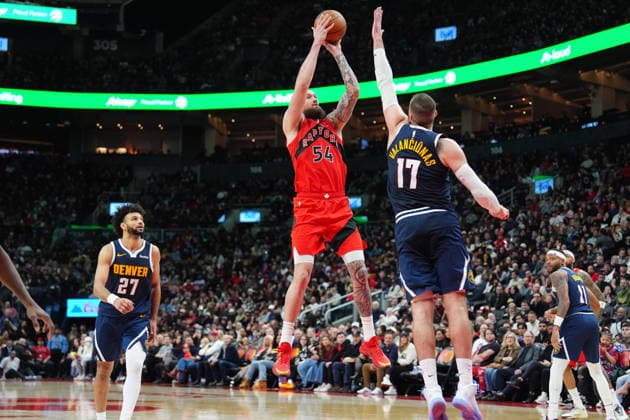 December 31, 2025, Toronto, On, CANADA: Toronto Raptors forward centre Sandro Mamukelashvili (54) shoots over Denver Nuggets centre Jonas ValanÄÂiAÂ«nas (17) during second half NBA, Basketball Herren, USA action in Toronto on Wednesday December 31, 2025. Canada News - December 31, 2025  - ZUMAc35_ 20251231_zaf_c35_055 Copyright: xFrankxGunnx