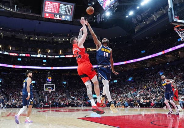 December 31, 2025, Toronto, On, CANADA: Toronto Raptors forward centre Sandro Mamukelashvili (54) and Denver Nuggets forward Daron Holmes II (14) battle for control of the ball during second half NBA, Basketball Herren, USA action in Toronto on Wednesday December 31, 2025. Canada News - December 31, 2025  - ZUMAc35_ 20251231_zaf_c35_057 Copyright: xFrankxGunnx