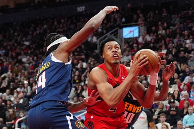 December 31, 2025, Toronto, On, CANADA: Toronto Raptors forward guard Scottie Barnes (4) heads toward the basket as Denver Nuggets forward Daron Holmes II (14) defends during second half NBA, Basketball Herren, USA action in Toronto on Wednesday December 31, 2025. Canada News - December 31, 2025  - ZUMAc35_ 20251231_zaf_c35_060 Copyright: xFrankxGunnx