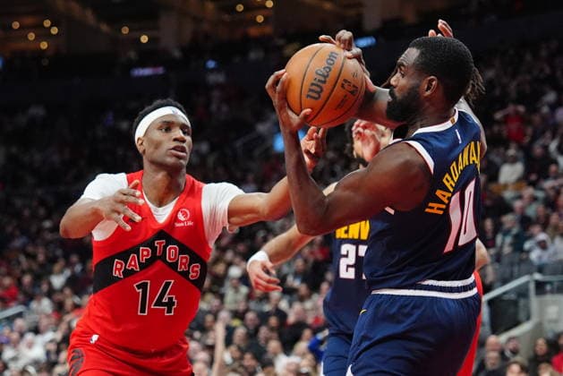 December 31, 2025, Toronto, On, CANADA: Toronto Raptors guard Ja Kobe Walter (14) battles with Denver Nuggets guard forward Tim Hardaway Jr. (10) for control of the ball during second half NBA, Basketball Herren, USA action in Toronto on Wednesday December 31, 2025. Canada News - December 31, 2025  - ZUMAc35_ 20251231_zaf_c35_068 Copyright: xFrankxGunnx