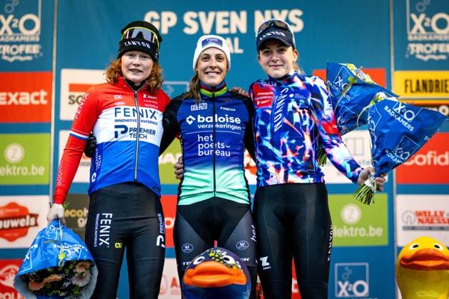 Dutch Puck Pieterse, Dutch Lucinda Brand and British Zoe Backstedt pictured on the podium after the women s elite race of the GP Sven Nys cyclocross cycling event on Thursday 01 January 2026 in Baal, stage 6 8 in the X2O Badkamers Trofee Veldrijden competition. DAVIDxPINTENS  x152853364x