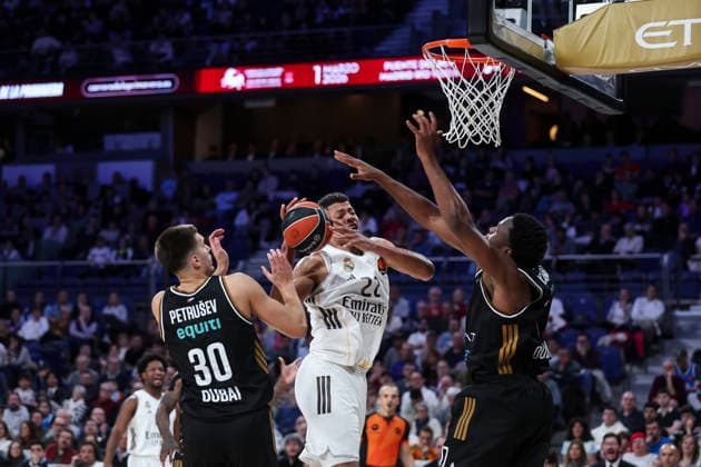 January 2, 2026, Madrid, Madrid, Spain: Filip Petrusev of Dubai Basketball, Walter Tavares of Real Madrid and Mckinley Wright IV of Dubai Basketball in action during the Turkish Airlines EuroLeague Regular Season Round 19 match between Real Madrid and Dubai Basketball at Movistar Arena on January 02 2026, in Madrid, Spain. Madrid Spain - ZUMAa181 20260102_zaa_a181_208 Copyright: xIrinaxR.xHipolitox