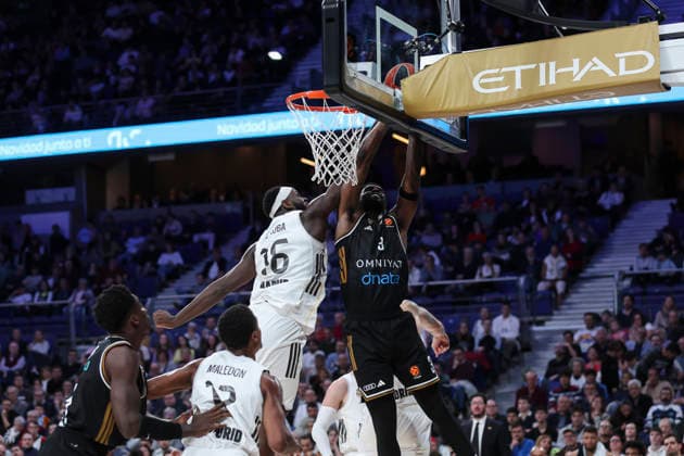 January 2, 2026, Madrid, Madrid, Spain: Usman Garuba of Real Madrid and Dwayne Bacon of Dubai Basketball in action during the Turkish Airlines EuroLeague Regular Season Round 19 match between Real Madrid and Dubai Basketball at Movistar Arena on January 02 2026, in Madrid, Spain. Madrid Spain - ZUMAa181 20260102_zaa_a181_277 Copyright: xIrinaxR.xHipolitox