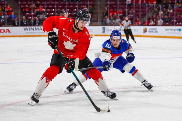 January 2, 2026, Minneapolis, Minnesota, United States: Slovakia forward TOMAS POBEZAL (10) attempts to steal the puck from Canada forward MICHAEL MISA (7). Canada and Slovakia faced off in the quarterfinal round of the IIHF World Junior Championship on January 2nd. Canada was victorious 7-1. Minneapolis United States - ZUMAt166 20260102_zsp_t166_089 Copyright: xMichaelxTurnerx