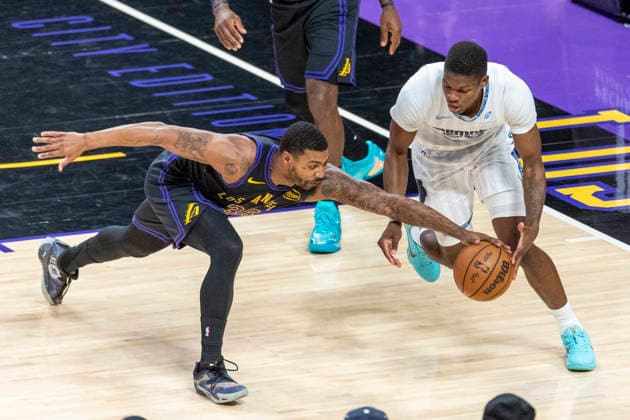 January 2, 2026, Los Angeles, California, USA: Los Angeles LakersÃ¢â‚¬â ¢ Marcus Smart (36) and Memphis Grizzlies Christian Koloko (35) vie for the ball during an NBA, Basketball Herren, USA basketball game at Crypto.com Arena on Friday, Jan. 2, 2026 in Los Angeles. Los Angeles USA - ZUMAc68_ 20260102_zaf_c68_005 Copyright: xRingoxChiux