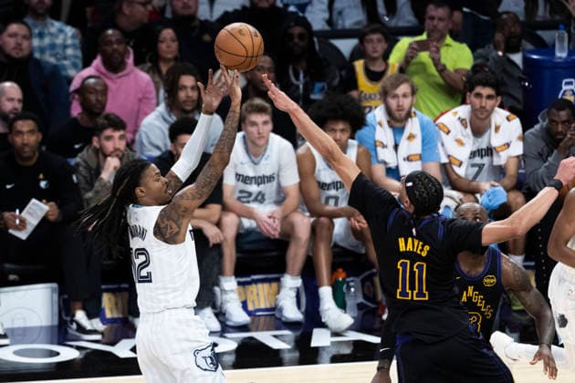 January 2, 2026, Los Angeles, California, USA: Memphis Grizzlies Ja Morant (12) shoots against Los Angeles LakersÃ¢â‚¬â ¢ Jaxson Hayes (11) during an NBA, Basketball Herren, USA basketball game at Crypto.com Arena on Friday, Jan. 2, 2026 in Los Angeles. Los Angeles USA - ZUMAc68_ 20260102_zaf_c68_023 Copyright: xRingoxChiux