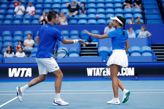 TENNIS UNITED CUP PERTH, Tiantsoa Rakotomanga Rajaonah and Edouard Roger-Vasselin of France in action against Belinda Bencic and Jakub Paul of Switzerland during the United Cup day two doubles match between Switzerland and France at RAC Arena in Perth, Saturday, January 3, 2026. ( NO ARCHIVING, EDITORIAL USE ONLY PERTH WESTERN AUSTRALIA AUSTRALIA  Copyright: xRICHARDxWAINWRIGHTx 20260103144816664842