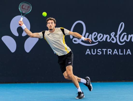 January 3, 2026, Brisbane, Qld, Australia: PABLO CARRENO BUSTA of Spain reaches for the ball during his MenÃ¢â‚¬â ¢s Singles qualifying round match against MATTIA BELLUCCI of Italy at the Brisbane International. Brisbane Australia - ZUMAt173 20260103_zsp_t173_018 Copyright: xStephanexThomasx