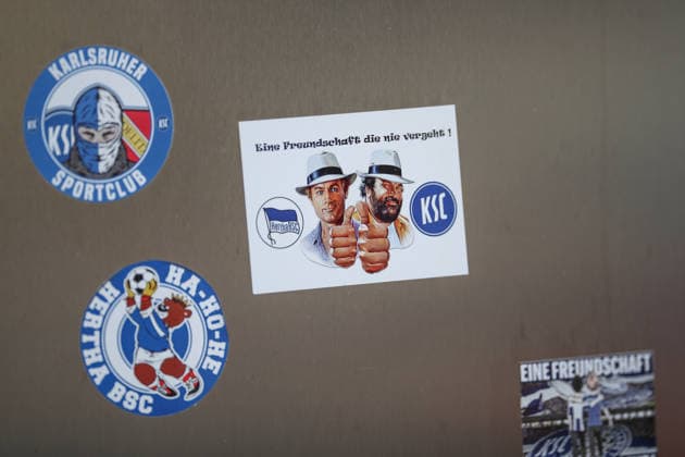 Adhesive patches with various stickers on topics including fan friendship between KSC and Hertha BSC, Karlsruher SC Fussball, 2 Bundesliga, training kick-off return round, 2025 2026, 03 01 2026, DFL REGULATIONS PROHIBIT ANY USE OF PHOTOGRAPHS AS IMAGE SEQUENCES AND OR QUASI VIDEO, Karlsruher SC Fussball, 2 Bundesliga, training kick-off return round, 2025 2026, 03 01 2026 Karlsruhe Copyright: xEibner-Pressefoto JanxPrihodax EP_JPA