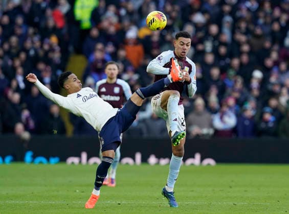 Birmingham, England, 3rd January 2026. Omari Hutchinson of Nottingham Forest (l) challenges Morgan Rogers of Aston Villa (r) during the Aston Villa vs Nottingham Forest Premier League match at Villa Park, Birmingham. Picture credit should read: Andrew Yates Sportimage EDITORIAL USE ONLY. No use with unauthorised audio, video, data, fixture lists, club league logos or live services. Online in-match use limited to 120 images, no video emulation. No use in betting, games or single club league player publications. SPI_031_AY_Villa_Forest SPI-4426-0031