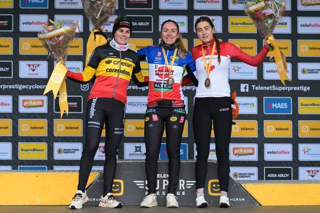Belgian Marion Norbert Riberolle, French Amandine Fouquenet and Canadian Rafaelle Carrier pictured on the podium after the women elite race at the cyclocross cycling event in Gullegem on Saturday 03 January 2026, stage 7 8 in the Superprestige cyclocross cycling competition DAVIDxPINTENS  x153276820x