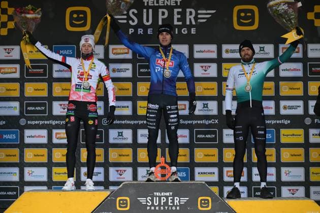Belgian Michael Vanthourenhout, Belgian Niels Vandeputte and Dutch Joris Nieuwenhuis pictured on the podium after the men elite race at the cyclocross cycling event in Gullegem on Saturday 03 January 2026, stage 7 8 in the Superprestige cyclocross cycling competition DAVIDxPINTENS  x153293547x