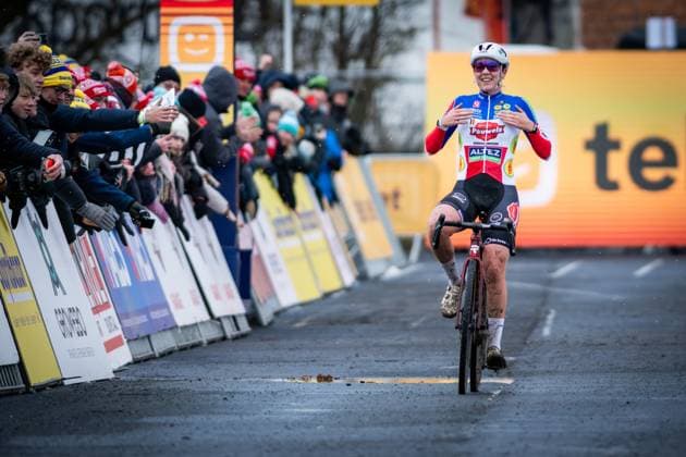 French Amandine Fouquenet celebrates as she crosses the finish line to win the women elite race at the cyclocross cycling event in Gullegem on Saturday 03 January 2026, stage 7 8 in the Superprestige cyclocross cycling competition DAVIDxPINTENS  x153300722x