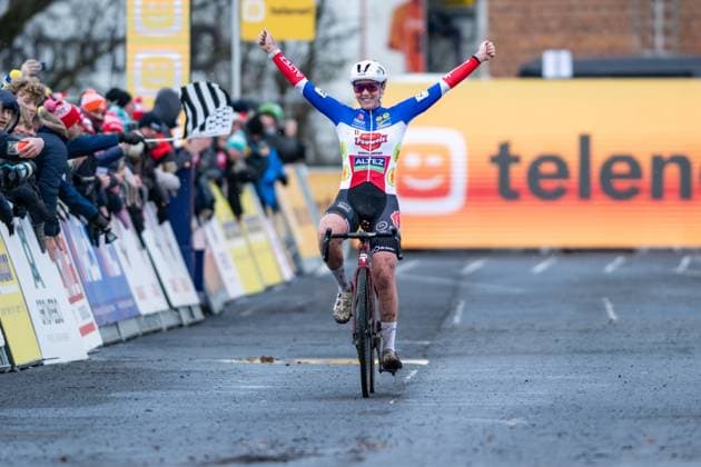 French Amandine Fouquenet celebrates as she crosses the finish line to win the women elite race at the cyclocross cycling event in Gullegem on Saturday 03 January 2026, stage 7 8 in the Superprestige cyclocross cycling competition DAVIDxPINTENS  x153301638x