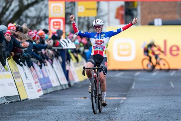 French Amandine Fouquenet celebrates as she crosses the finish line to win the women elite race at the cyclocross cycling event in Gullegem on Saturday 03 January 2026, stage 7 8 in the Superprestige cyclocross cycling competition DAVIDxPINTENS  x153301689x