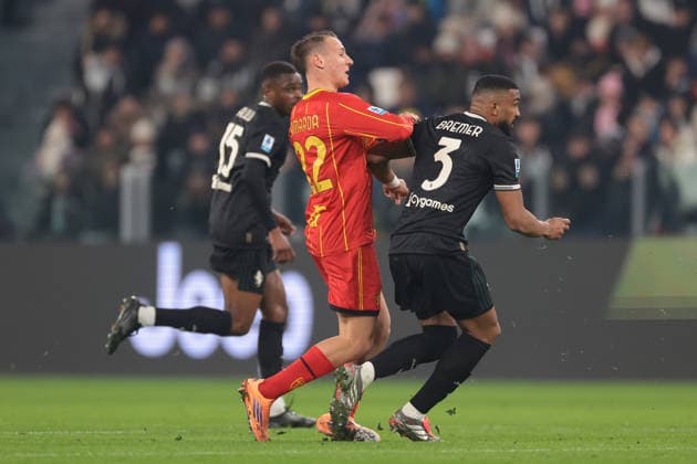 Turin, Italy, 3rd January 2026. Francesco Camarda of US Lecce twists his ankle as he clashes with Gleison Bremer of Juventus during the Juventus vs Lecce Serie A match at Allianz Stadium, Turin. Picture credit should read: Jonathan Moscrop Sportimage EDITORIAL USE ONLY. No use with unauthorised audio, video, data, fixture lists, club league logos or live services. Online in-match use limited to 120 images, no video emulation. No use in betting, games or single club league player publications. SPI_021_JM_JUVE_LECCE SPI-4406-0021