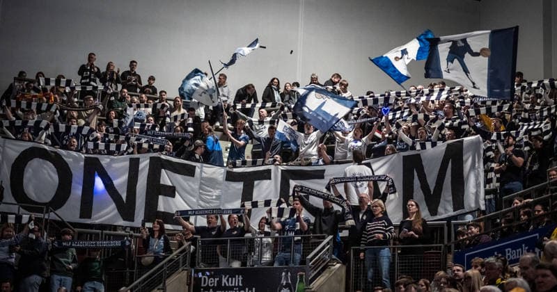 Fan block of the MLP Academics Heidelberg with scarves, flags and banner ONE TEAM in the MHP Arena GER, MHP Riesen Ludwigsburg MLP Academics Heidelberg, easycredit BBL, Basketball, Bundesliga, 14 Matchday, Season 2025 2026, 03 01 2026 GER, MHP Riesen Ludwigsburg MLP Academics Heidelberg, easycredit BBL, Basketball, Bundesliga, 14 Matchday, Season 2025 2026, 03 01 2026 Ludwigsburg Copyright: xSandyxDinkelackerx EP_SDR